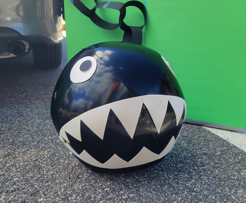 Chain Chomp from Super Mario made from a black beach ball and foam with construction paper chain